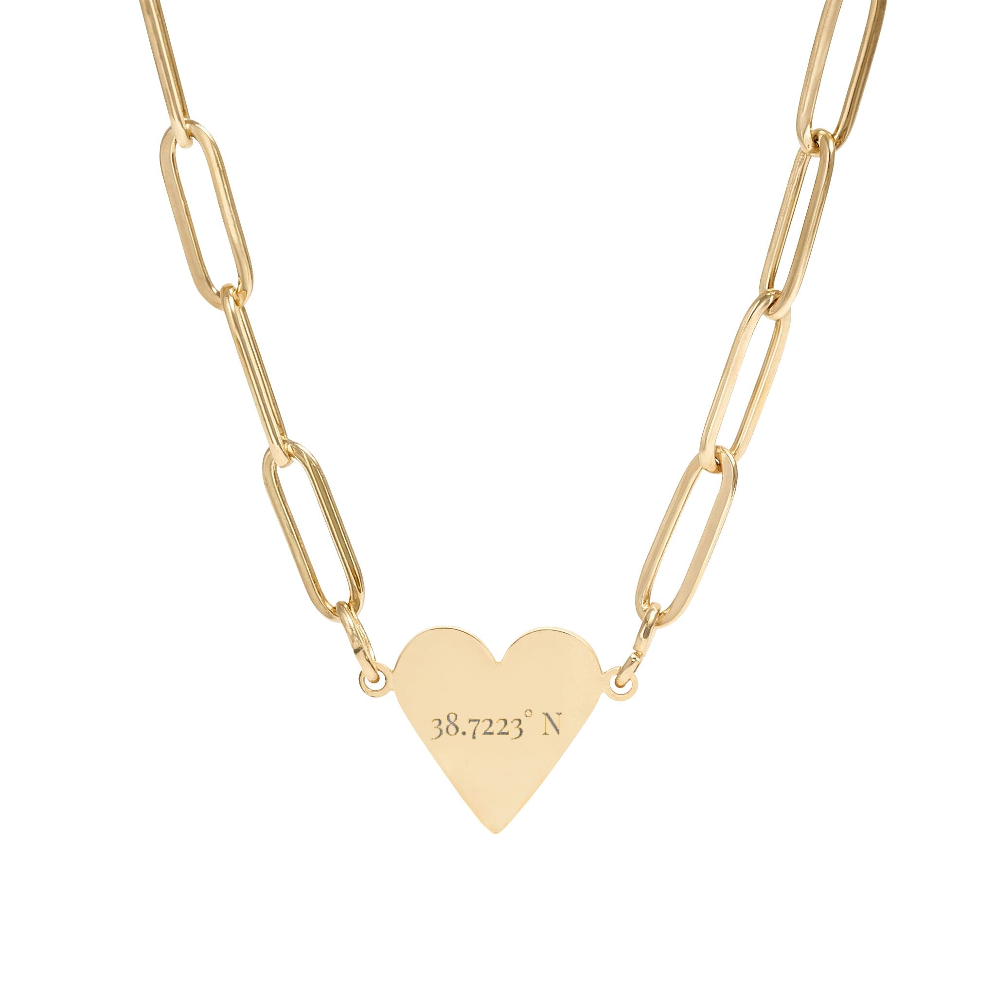 Gold heart-shaped pendant on a gold chain against a white background