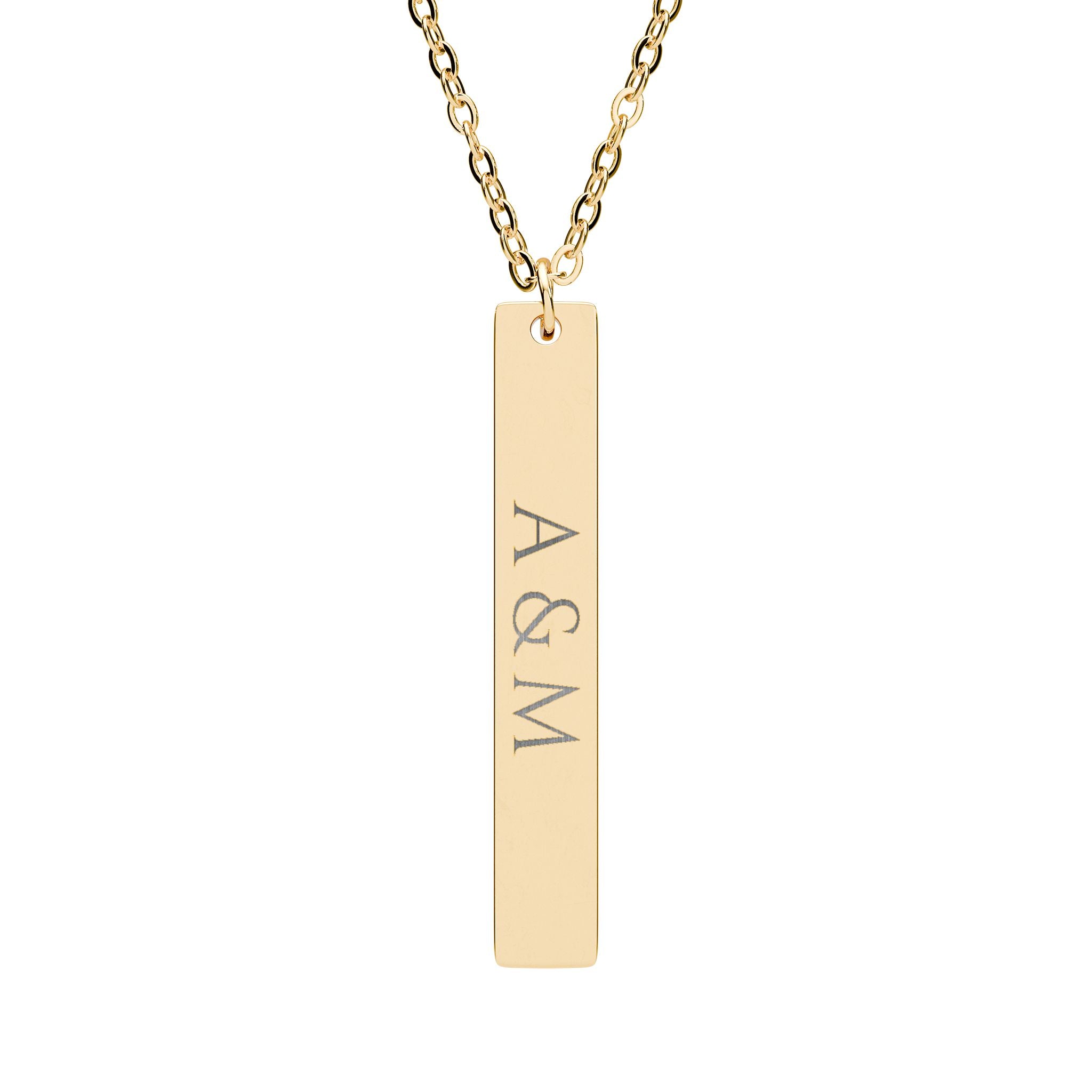 Gold necklace with a bar pendant featuring initials on a white background