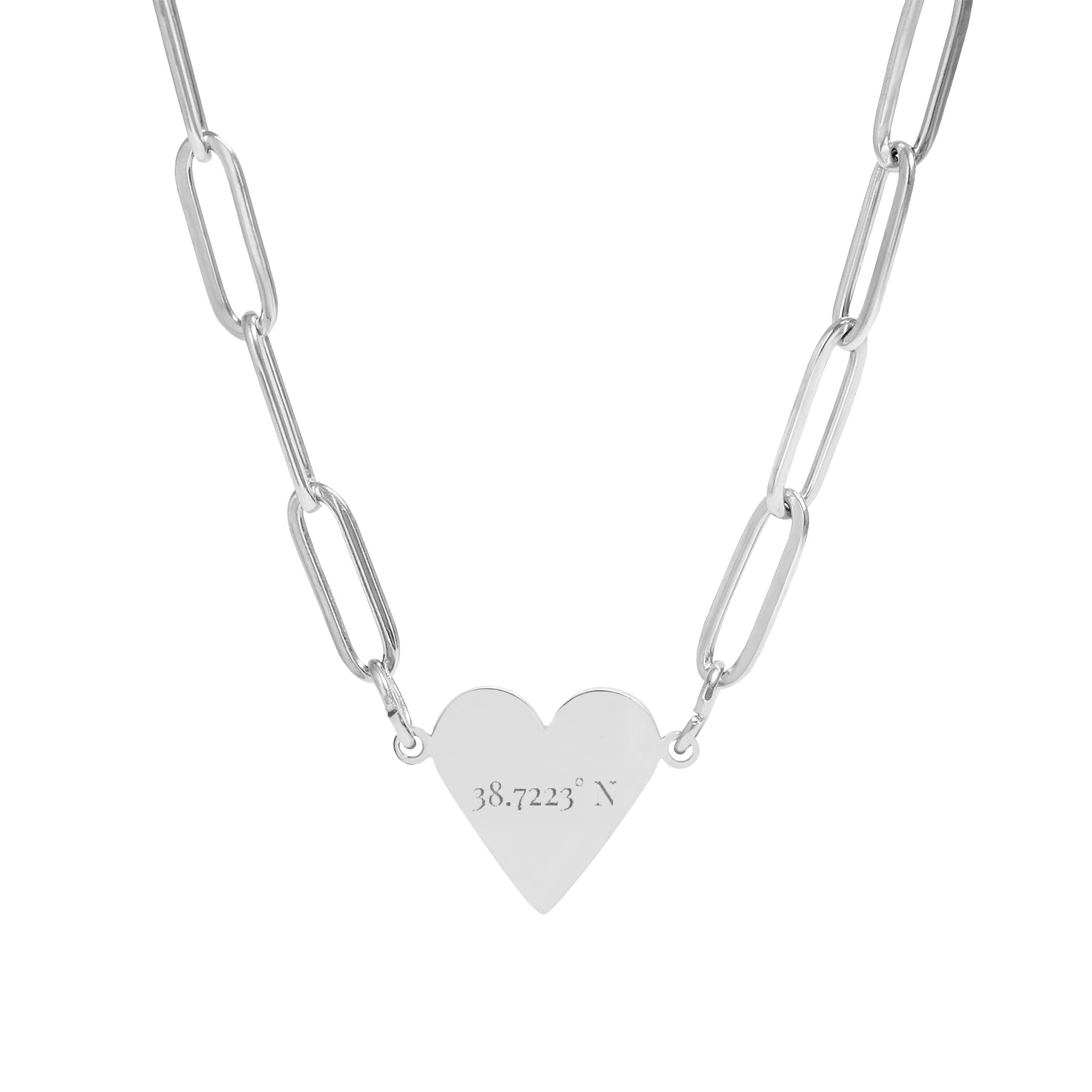 Silver heart-shaped pendant on a chain against a white background
