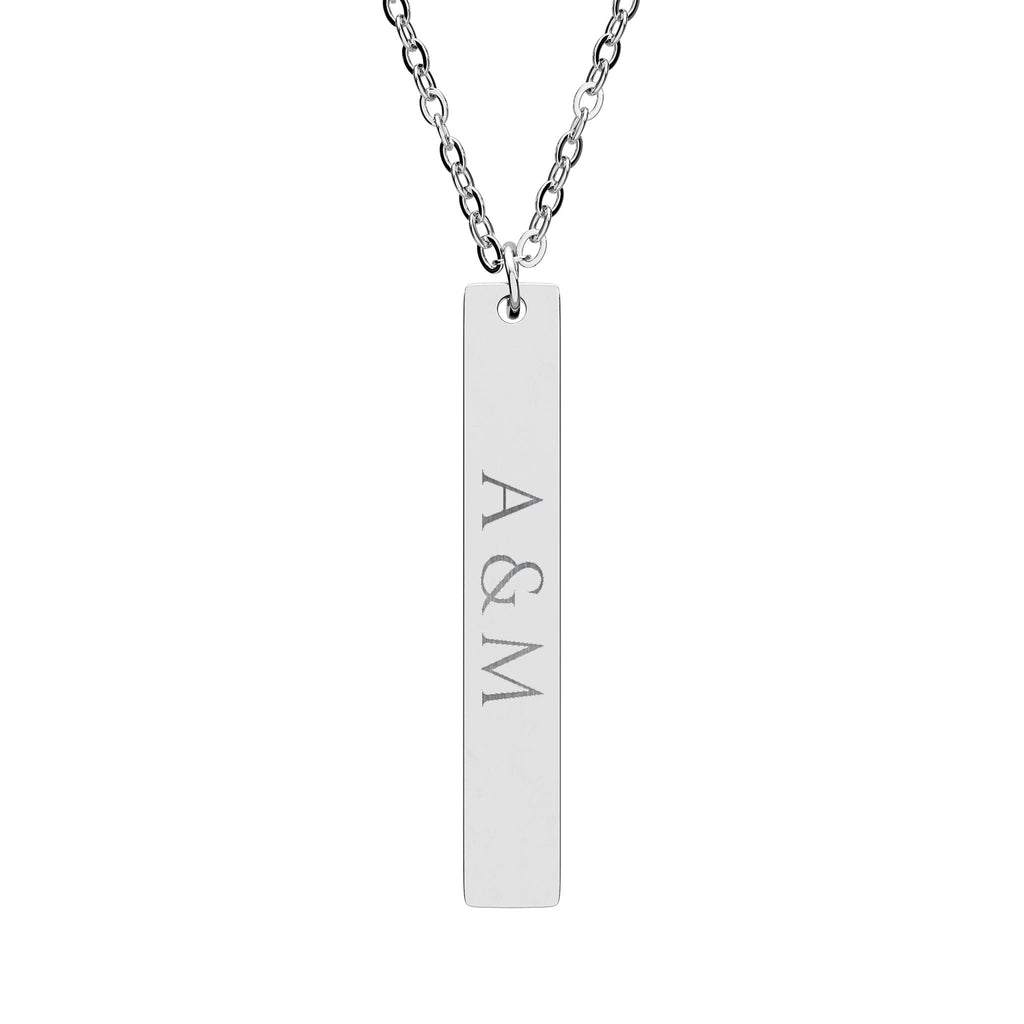 Silver necklace with a bar pendant engraved with 'A & M' on a white background